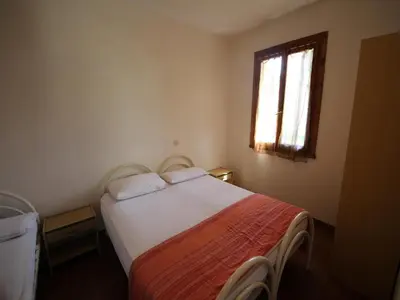 Letto o letti in una camera di Spacious Apartment in Rosolina Mare