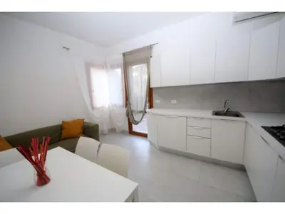 Cucina o angolo cottura di Rosolina Mare Getaway near Adriatic Sea