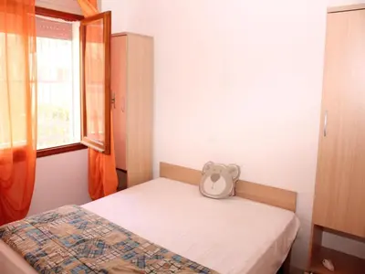 Letto o letti in una camera di Tranquil Villa for 6 in Rosolina Mare