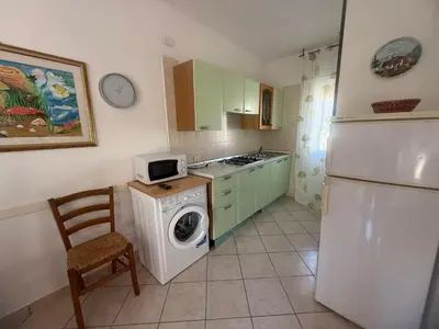 Cucina o angolo cottura di Tranquil Villa for 6 in Rosolina Mare