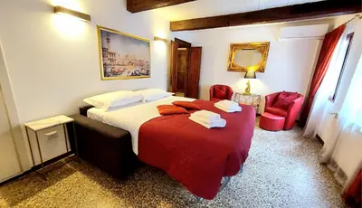 Letto o letti in una camera di Rialto Penthouse