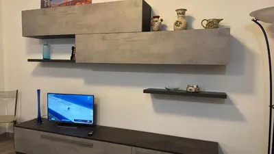 TV o dispositivi per l'intrattenimento presso Tarvisium Apartment