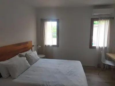 Letto o letti in una camera di Ca' Rino - alloggio turistico