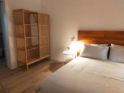 Letto o letti in una camera di Ca' Rino - alloggio turistico