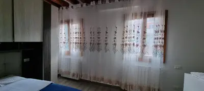 Letto o letti in una camera di Casa del Capitello