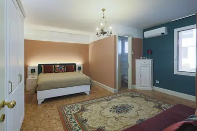 Letto o letti in una camera di Guest House di Gianni Martinello