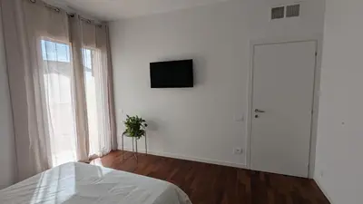 Letto o letti in una camera di Gottardo Apartments