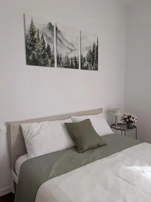 Letto o letti in una camera di Gottardo Apartments