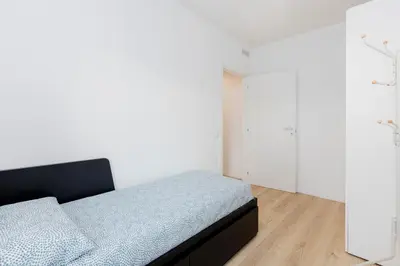Letto o letti in una camera di Appartamento con 2 Camere vicino a Centro e Stazione, Bassano del Grappa