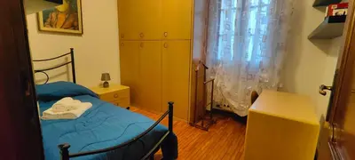 Letto o letti in una camera di La casa dei nonni