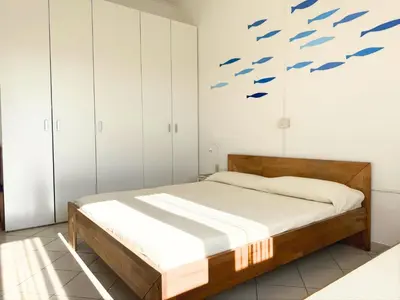 Letto o letti in una camera di Ai Pioppi - Home immobiliare