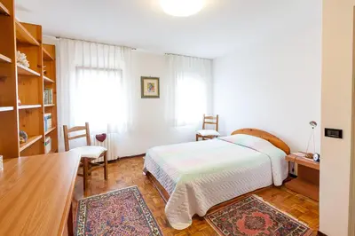 Letto o letti in una camera di B&B Cà Dea Calle