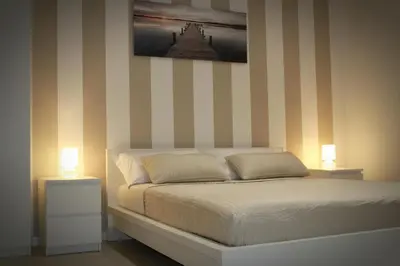 Letto o letti in una camera di BSuites Apartment