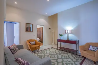 Area soggiorno di Canaletto Apartment with Canal View in Dorsoduro