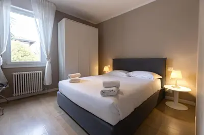 Letto o letti in una camera di Hotiday Padova San Giuseppe