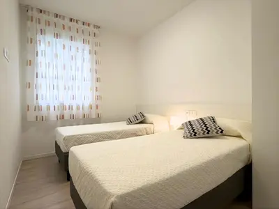 Letto o letti in una camera di Permar - Home immobiliare