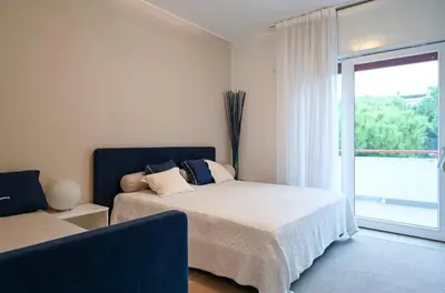 Letto o letti in una camera di Villa Oliva 8 - Carraro Immobiliare - Family Apartments
