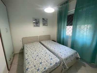 Letto o letti in una camera di Cozy flat at a short distance from Rosolina beach