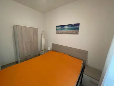 Letto o letti in una camera di Cozy flat at a short distance from Rosolina beach