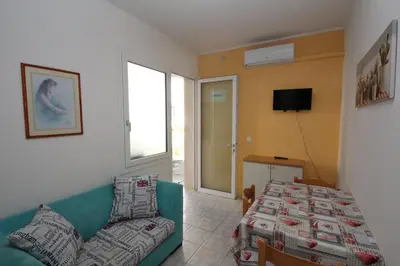 Letto o letti in una camera di Rosolina Mare flat near beach