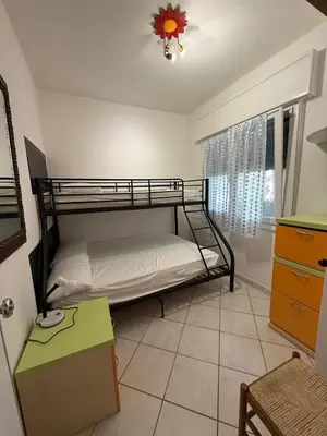 Letto o letti in una camera di Nice family villa in Rosolina Mare