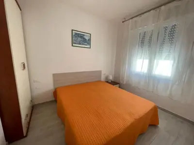 Letto o letti in una camera di Inviting flat for four guests in Rosolina Mare