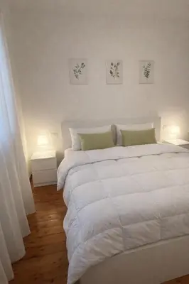 Letto o letti in una camera di Casa Gaidon