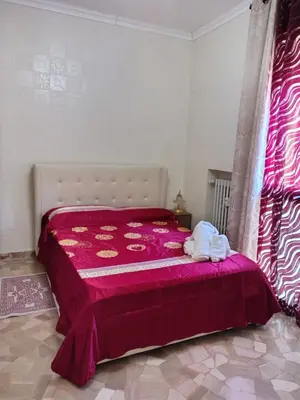 Letto o letti in una camera di Locazione Turistica