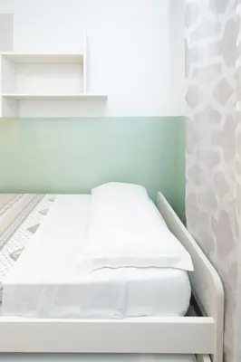 Letto o letti in una camera di Casa Miki