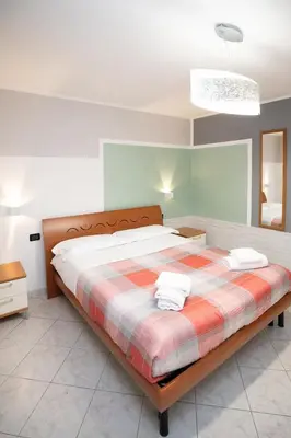 Letto o letti in una camera di Casa Miki