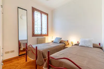 Letto o letti in una camera di Casa del Sole ,sleep up to 6, 2 bathrooms,1 minute from the beach