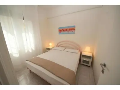Letto o letti in una camera di Beachside apartment in Rosolina Mare