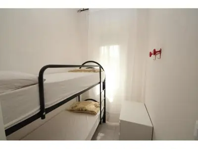 Letto o letti in una camera di Beachside apartment in Rosolina Mare