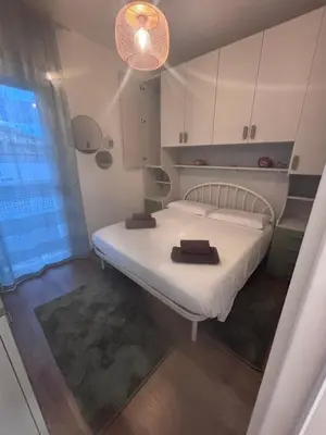 Letto o letti in una camera di Lella sea house