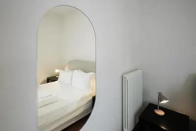 Letto o letti in una camera di Welc-ōM Sant'Eufemia Padova