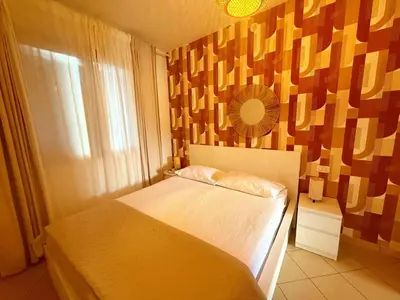 Letto o letti in una camera di Apartment with premium amenities, Rosolina