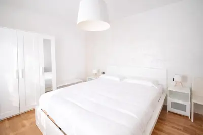 Letto o letti in una camera di Domus Solferino - Private Parking near Airport & City Center