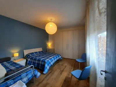 Letto o letti in una camera di PadovaResidence Apartments - vicino Cappella degli Scrovegni e Ospedale