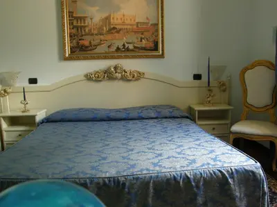Letto o letti in una camera di Residence Meuble' Cortina