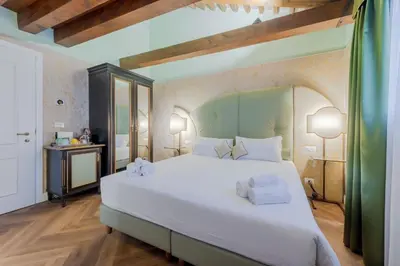 Letto o letti in una camera di 312 Piazza San Marco - Relais il Doge