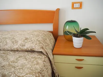 Letto o letti in una camera di Family Apartments Residence Trieste