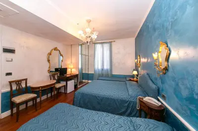 Letto o letti in una camera di Hotel Pantalon