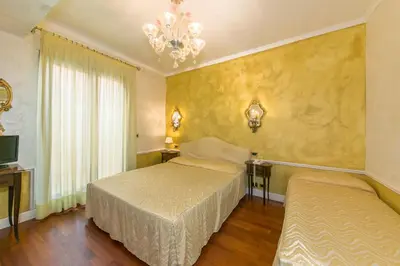 Letto o letti in una camera di Hotel Pantalon