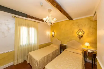 Letto o letti in una camera di Hotel Pantalon