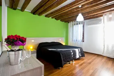 Letto o letti in una camera di Good Wine Apartments
