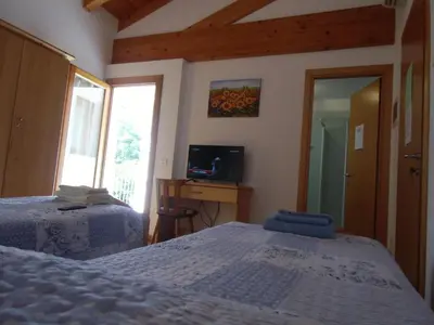 Letto o letti in una camera di Agriturismo il Podere Vedelago con San Bernardo, Alpaca e una Pentola di cose da scoprire