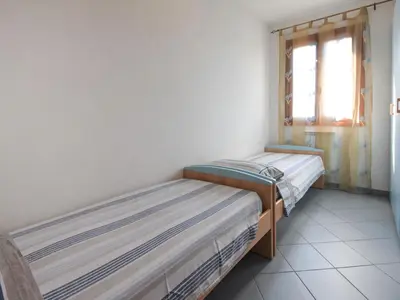Letto o letti in una camera di Apartment Solmare-31 by Interhome