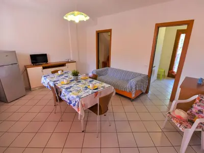 Area soggiorno di Apartment Solmare-31 by Interhome