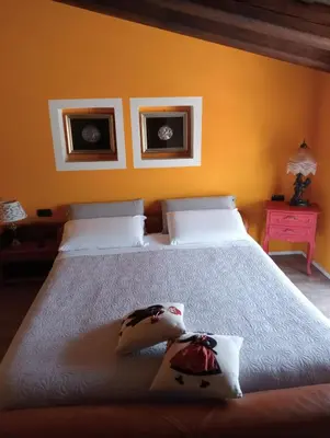 Letto o letti in una camera di Casa Degli Amici