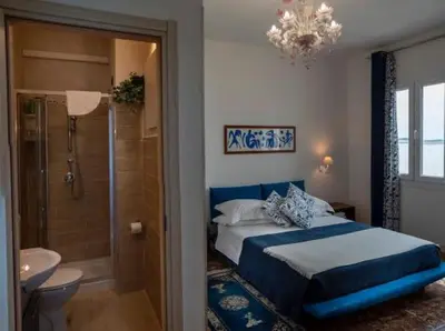 Letto o letti in una camera di Casa Sulla Laguna